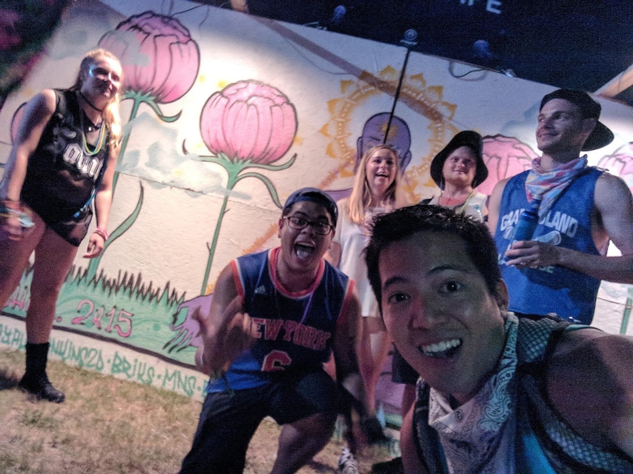 Photobombed selfie with a couple taking a picture